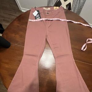 Rock and Roll cowgirl. Extra soft flexable jeans in a dusty mauve color